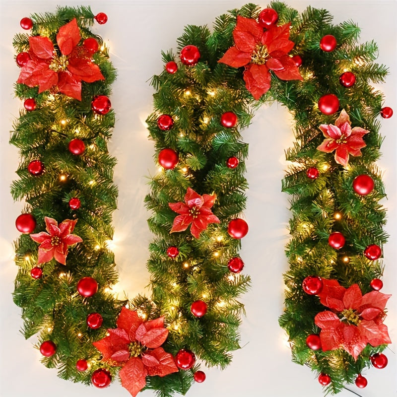 Decorative Christmas garland with red poinsettias and lights on a white background
