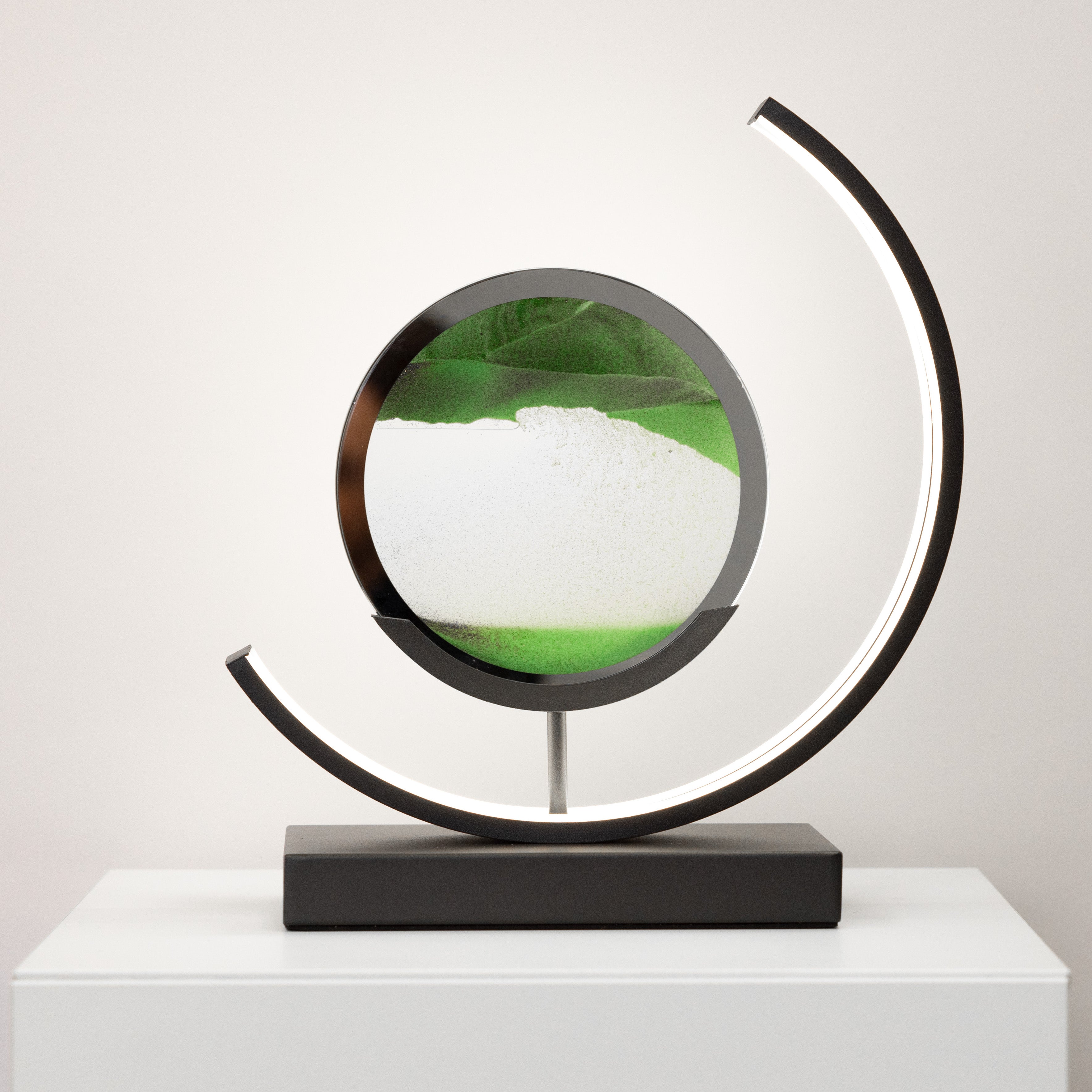 Decorative object with a circular design on a white surface