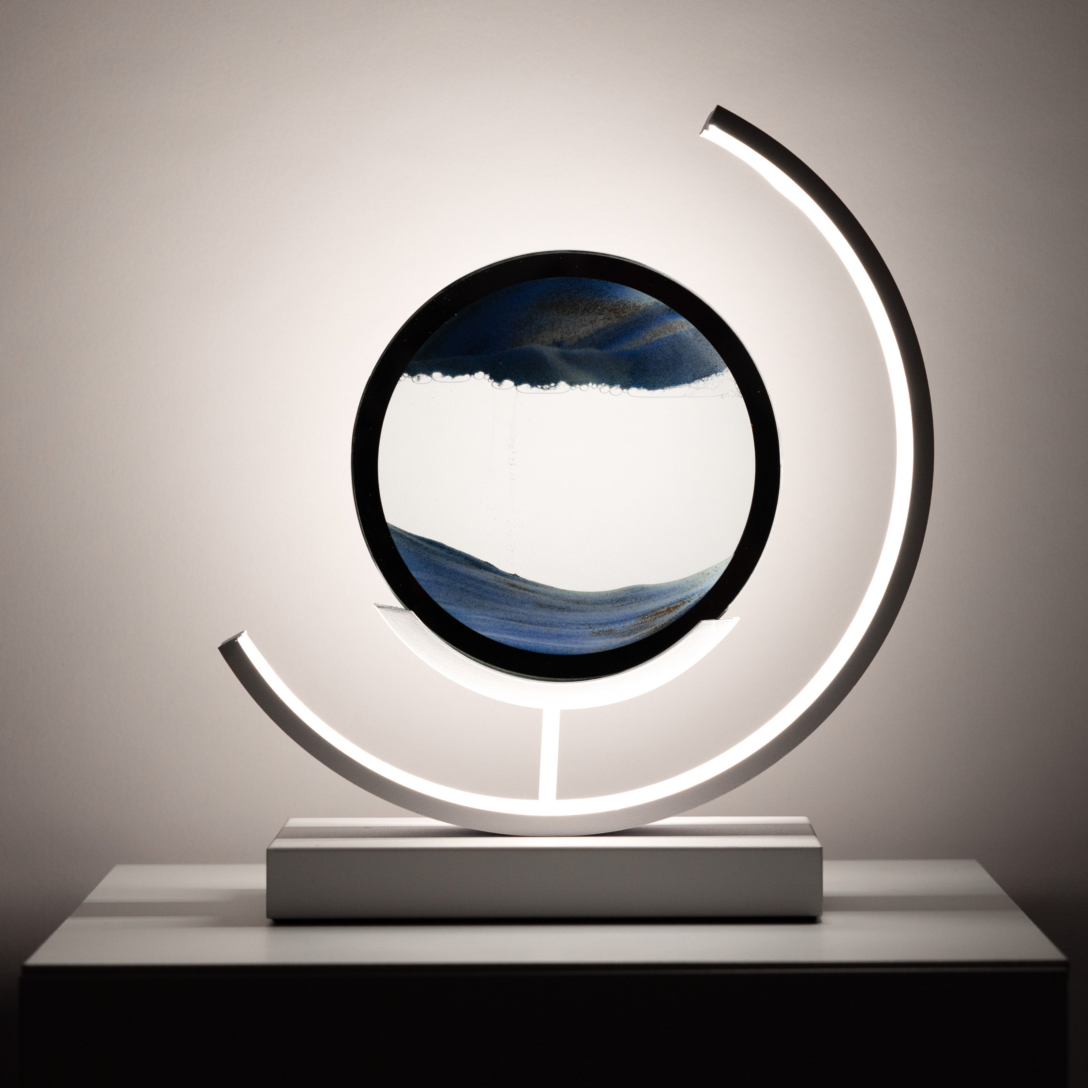 Modern decorative lamp with circular design on a neutral background