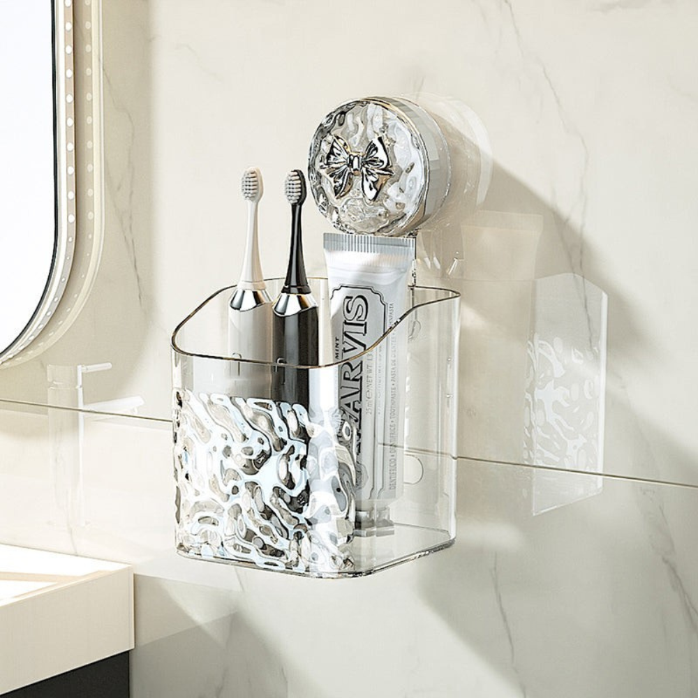 Clear wall-mounted organizer with toothbrushes and a bottle labeled 'Carvis' in a bathroom setting.