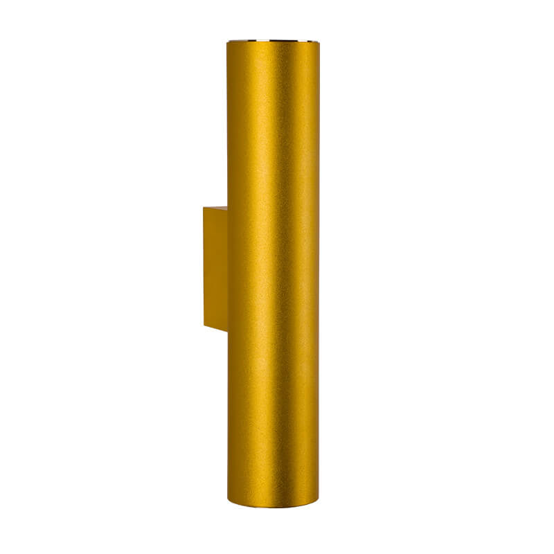 Gold cylindrical wall light fixture on a white background