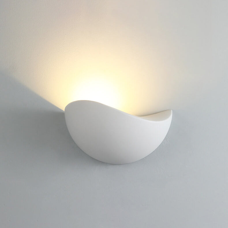 Modern wall-mounted light fixture on a gray background