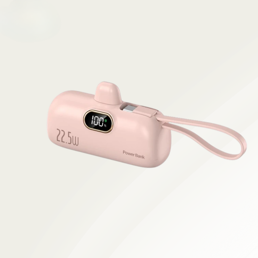 Pink power bank with digital display on a light gray background