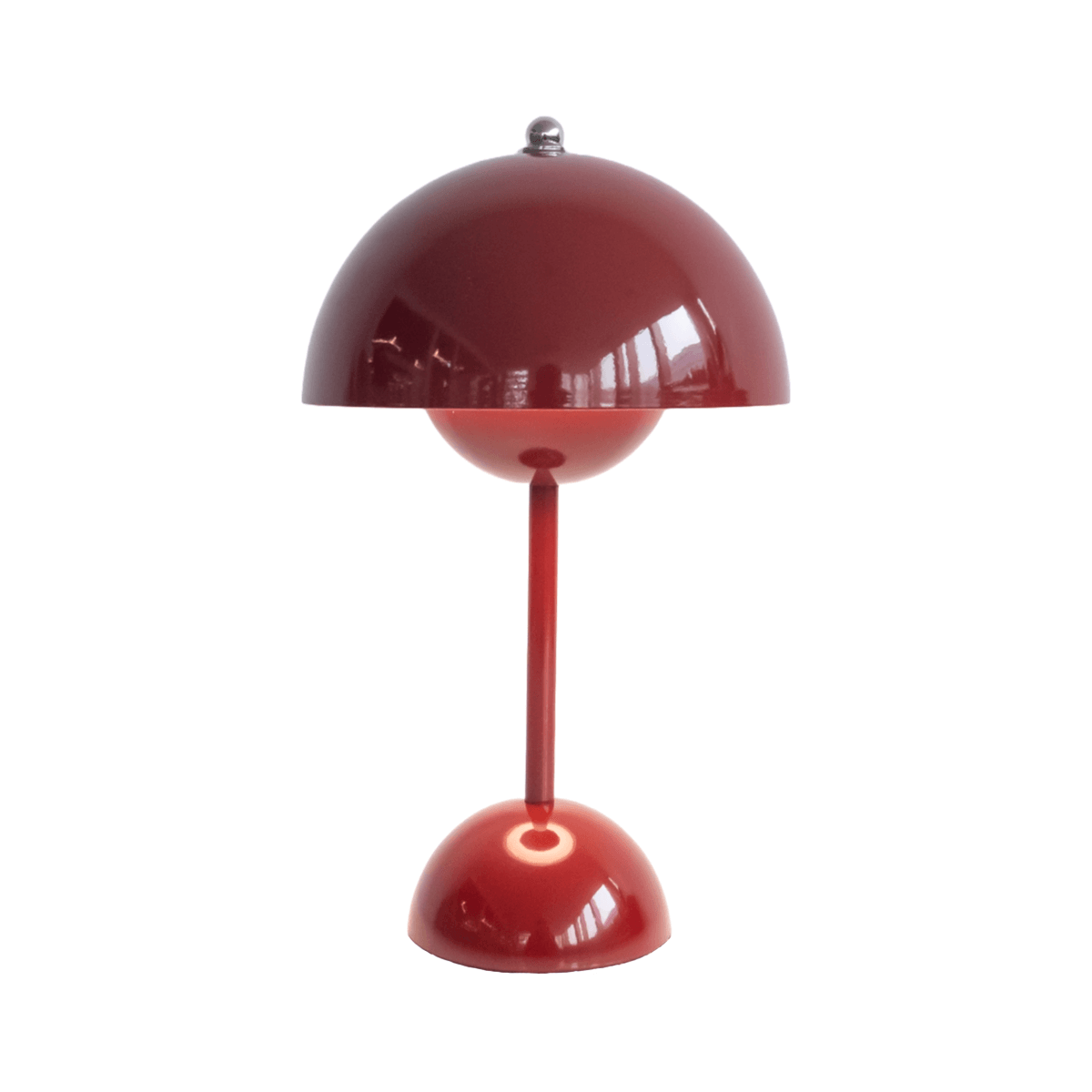 Red lamp with a unique design on a white background