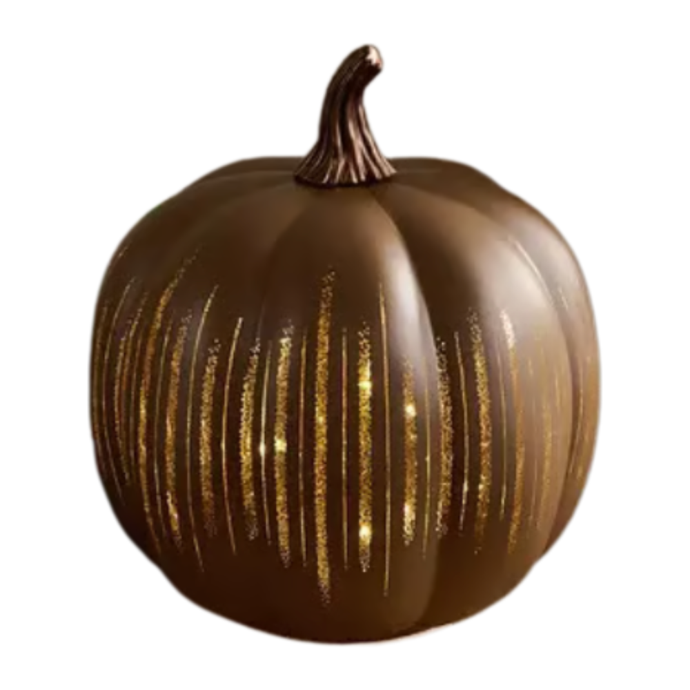 Decorative pumpkin with gold stripes on a white background