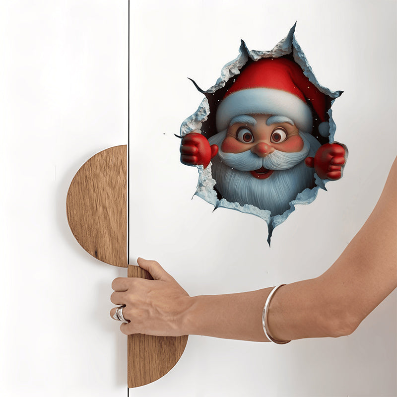 Hand opening a door with a Santa Claus sticker peering through a hole.