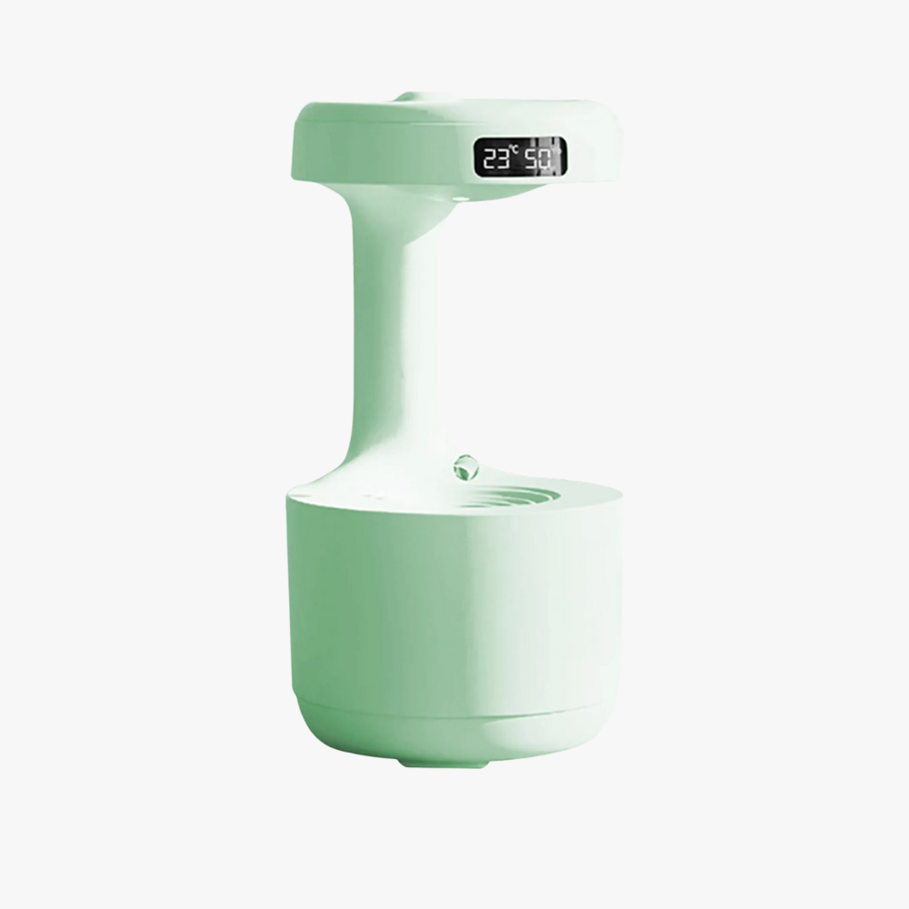 Green humidifier with digital display on a white background