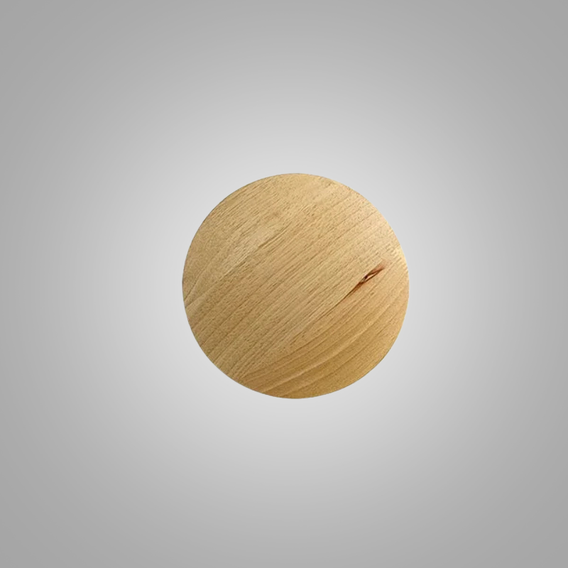Round wooden object on a gray background