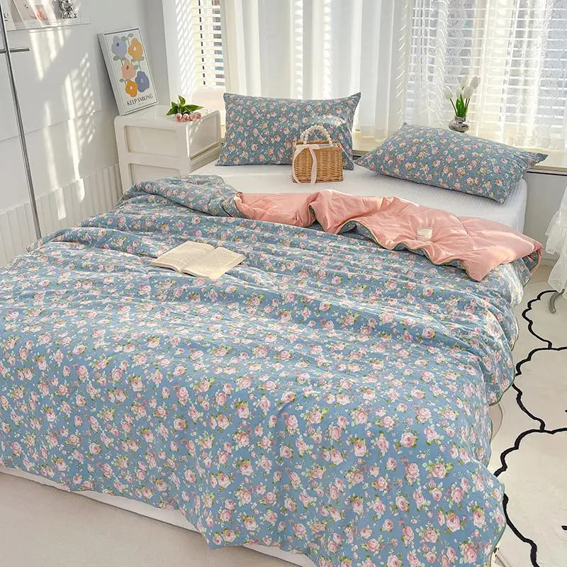 Floral bedding set on a bed in a bright bedroom