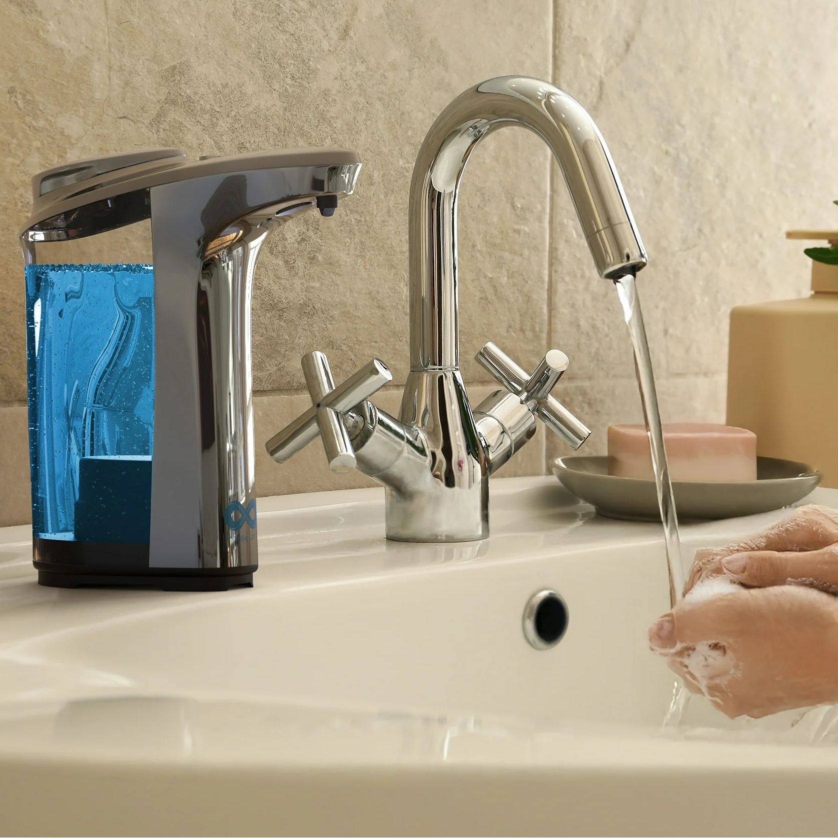 Person washing hands with soap under a faucet, with a dispenser labeled 'Sanitize in Seconds' on a bathroom counter.