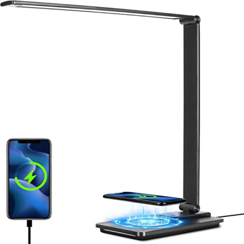 Black LED desk lamp with wireless charging pad on a white background