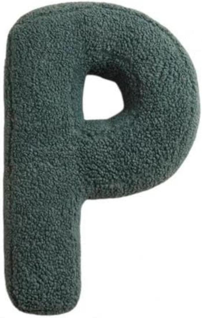 Green letter 'P' plush toy on a white background