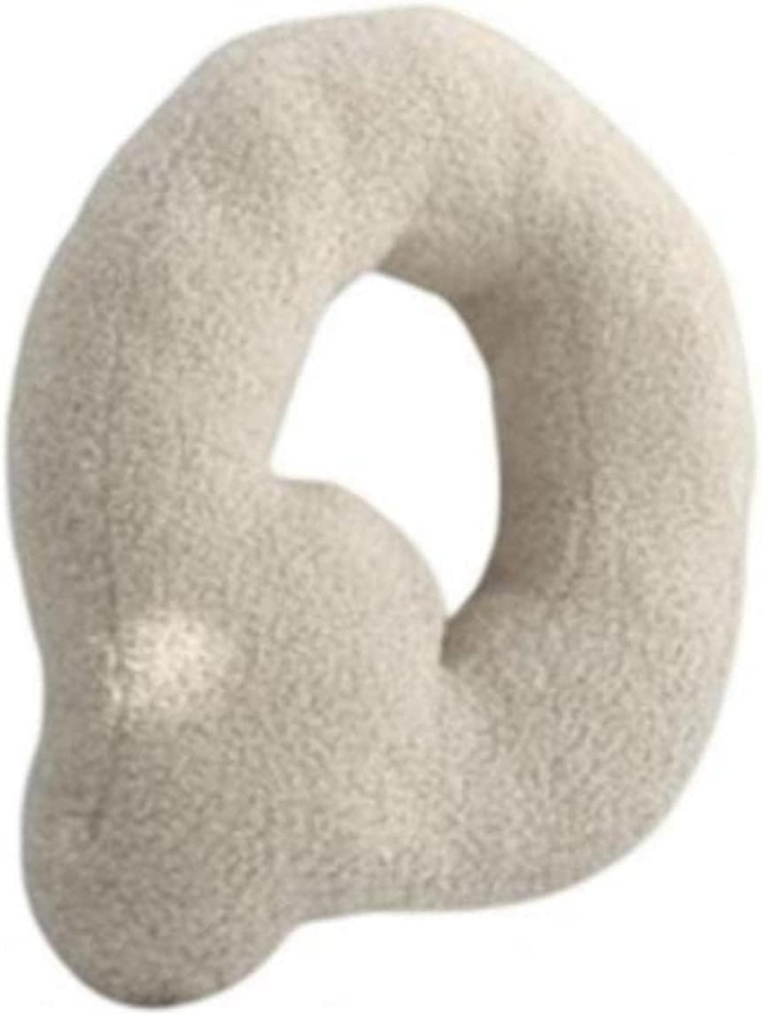 Beige neck pillow on a white background