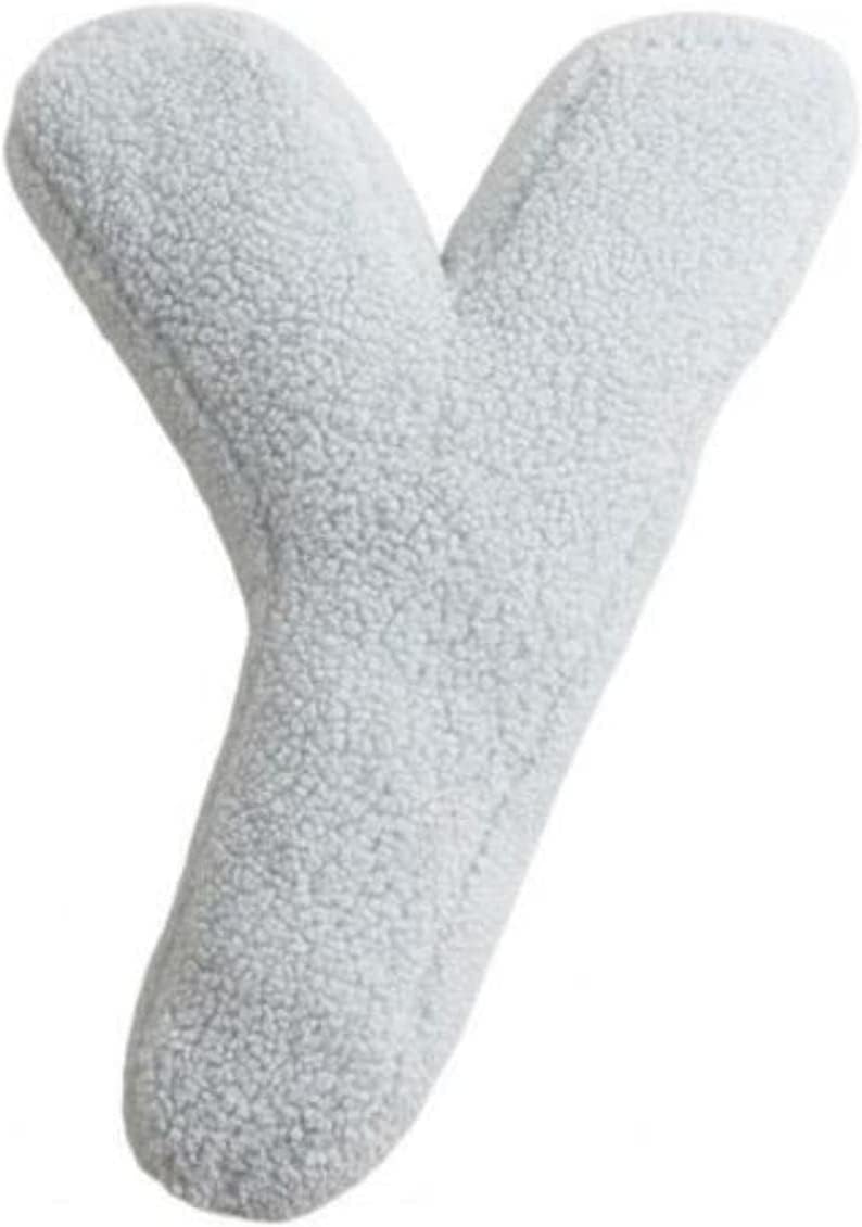 Pair of gray fuzzy socks on a white background
