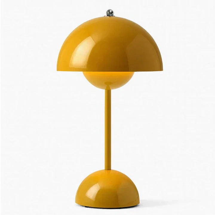 Yellow table lamp with a modern design on a white background