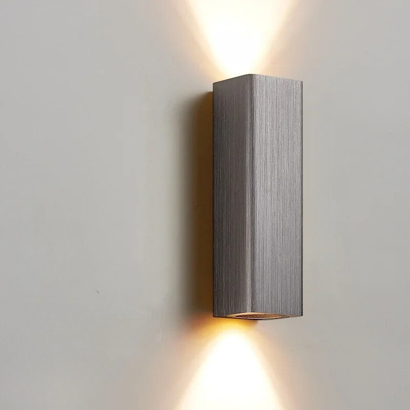 Square wall light fixture on a plain wall