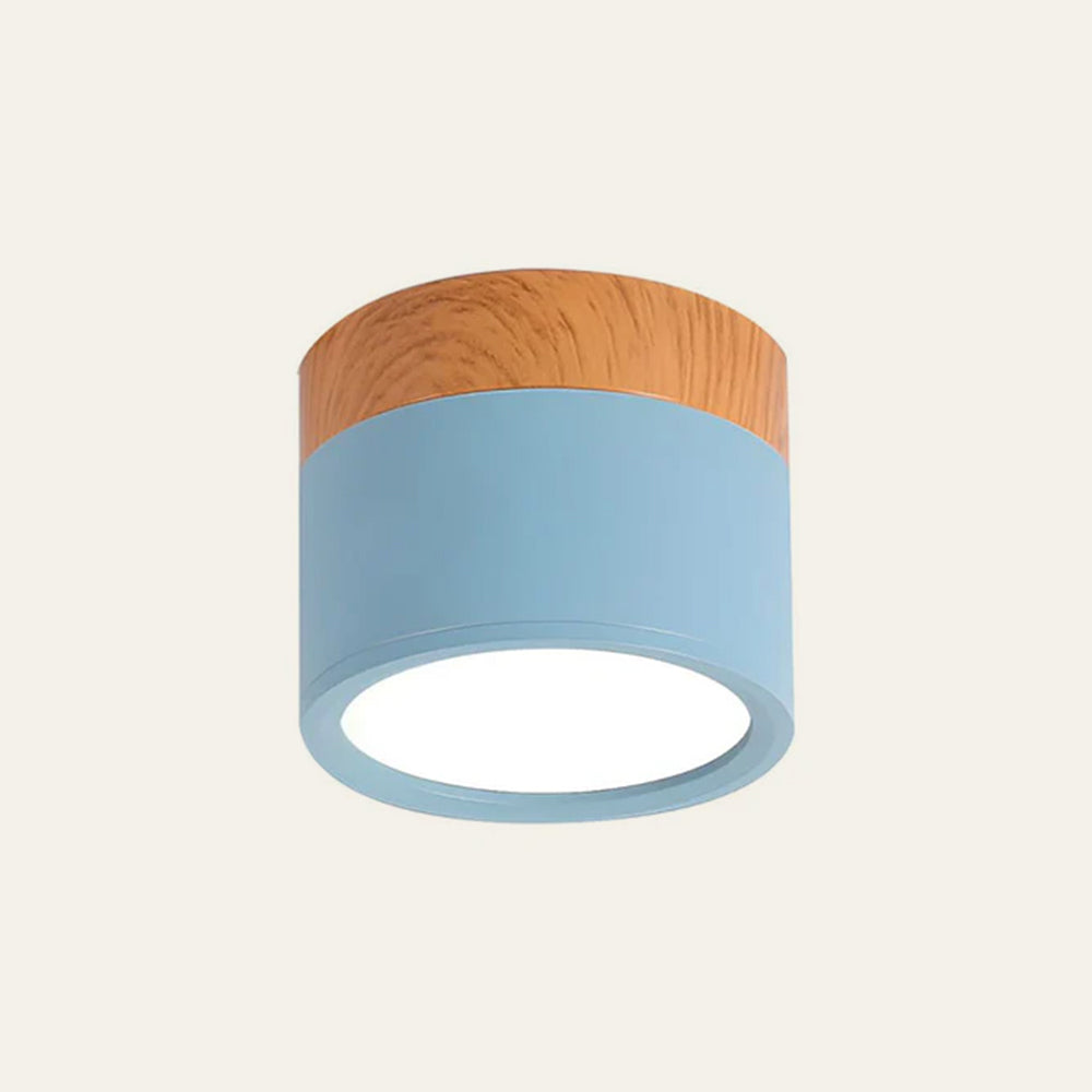 Ceiling light fixture with blue base and wooden top on a white background