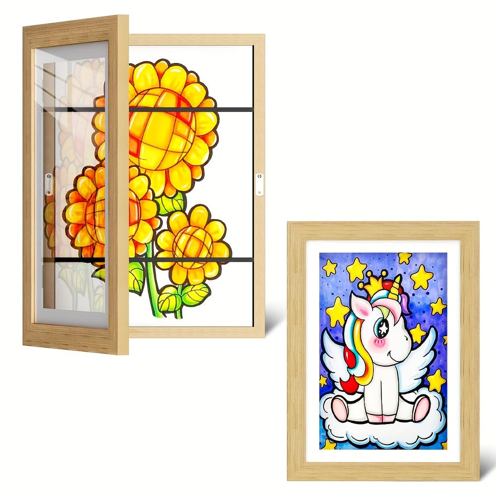 Framed stained glass window with yellow flowers and a framed illustration of a unicorn on a white background.