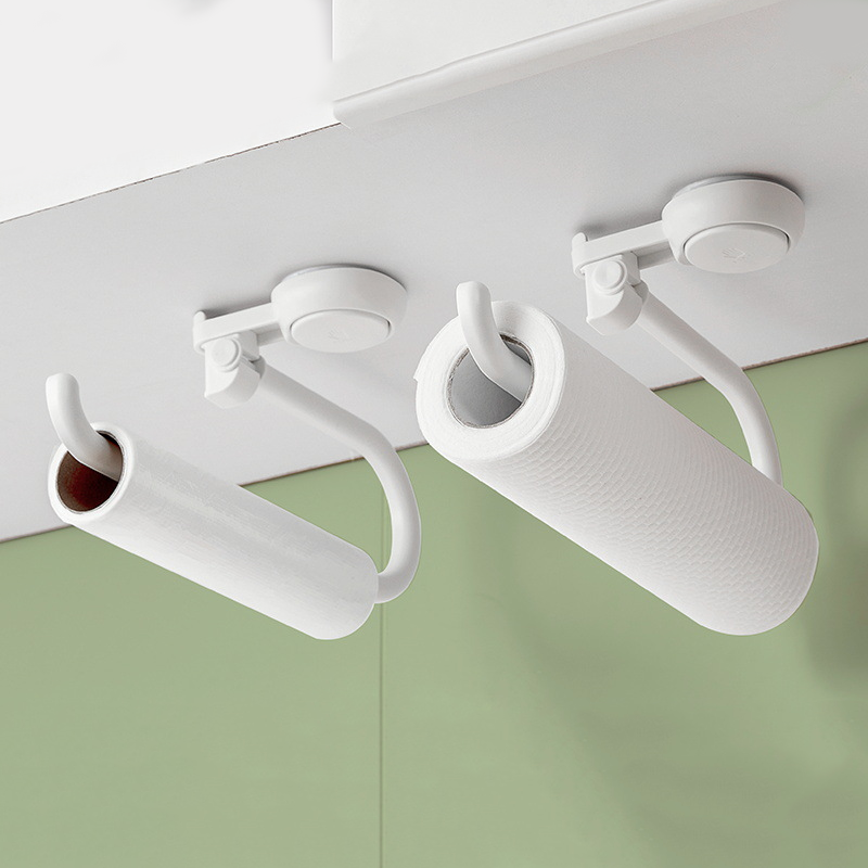 White ceiling light fixture with multiple arms on a white ceiling.