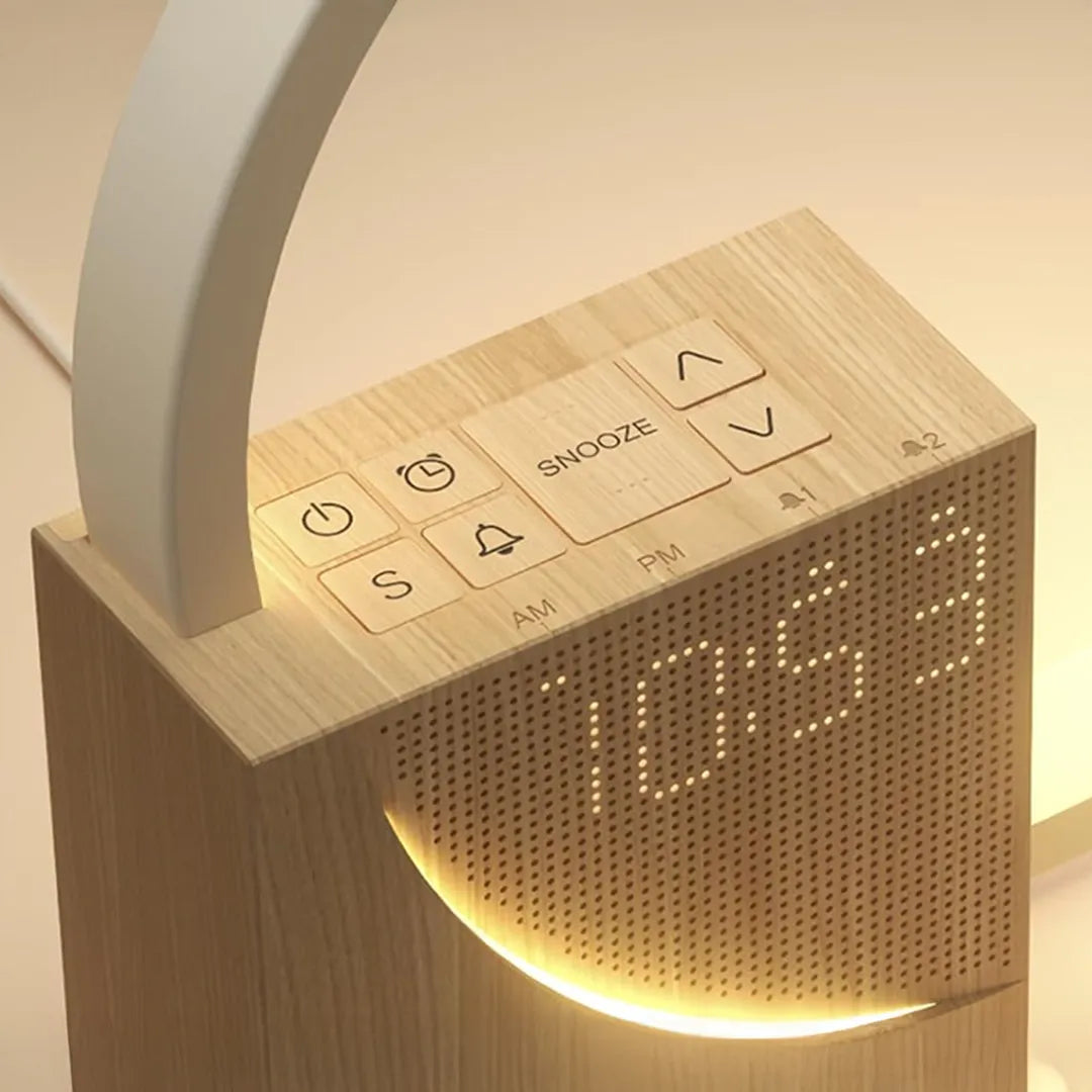 Wooden alarm clock with digital display and control buttons on a light background