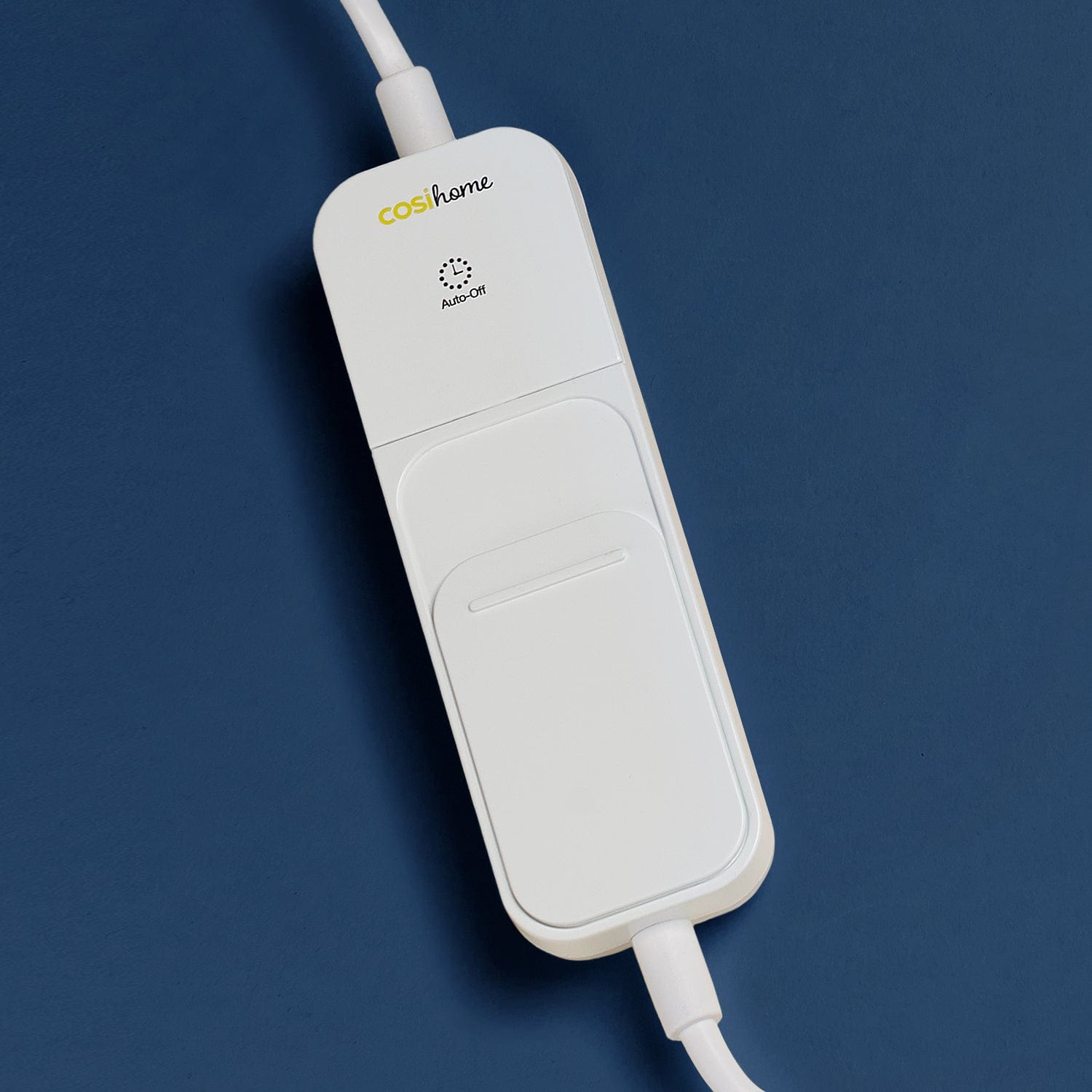 White electronic device with a cord on a blue background