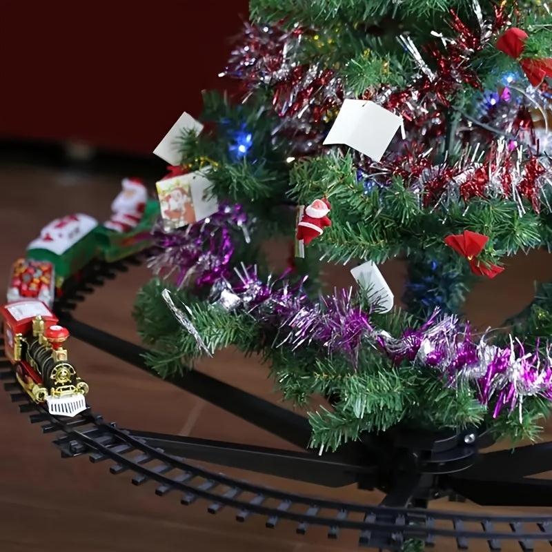Toy train on a track around a decorated Christmas tree with lights and tinsel.