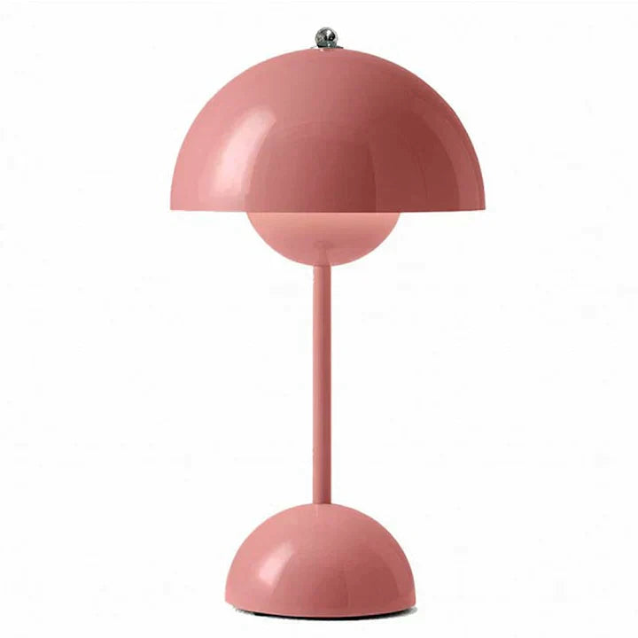 Pink table lamp with a white background