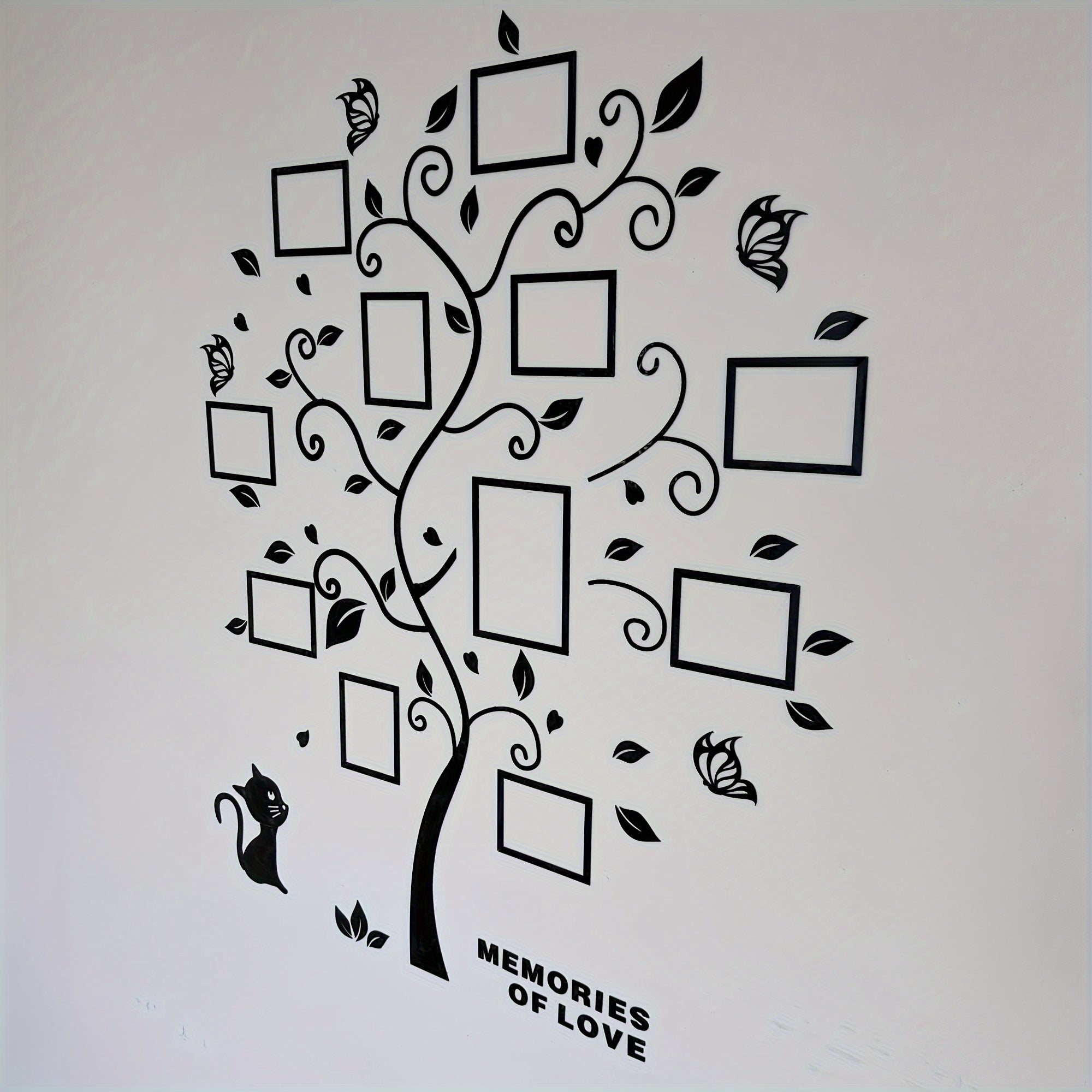 Decorative wall sticker of a tree with photo frames and 'Memories of Love' text on a white background.