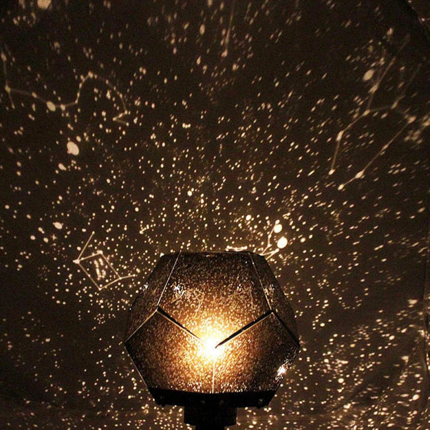 Star projector on a dark background with starlight pattern