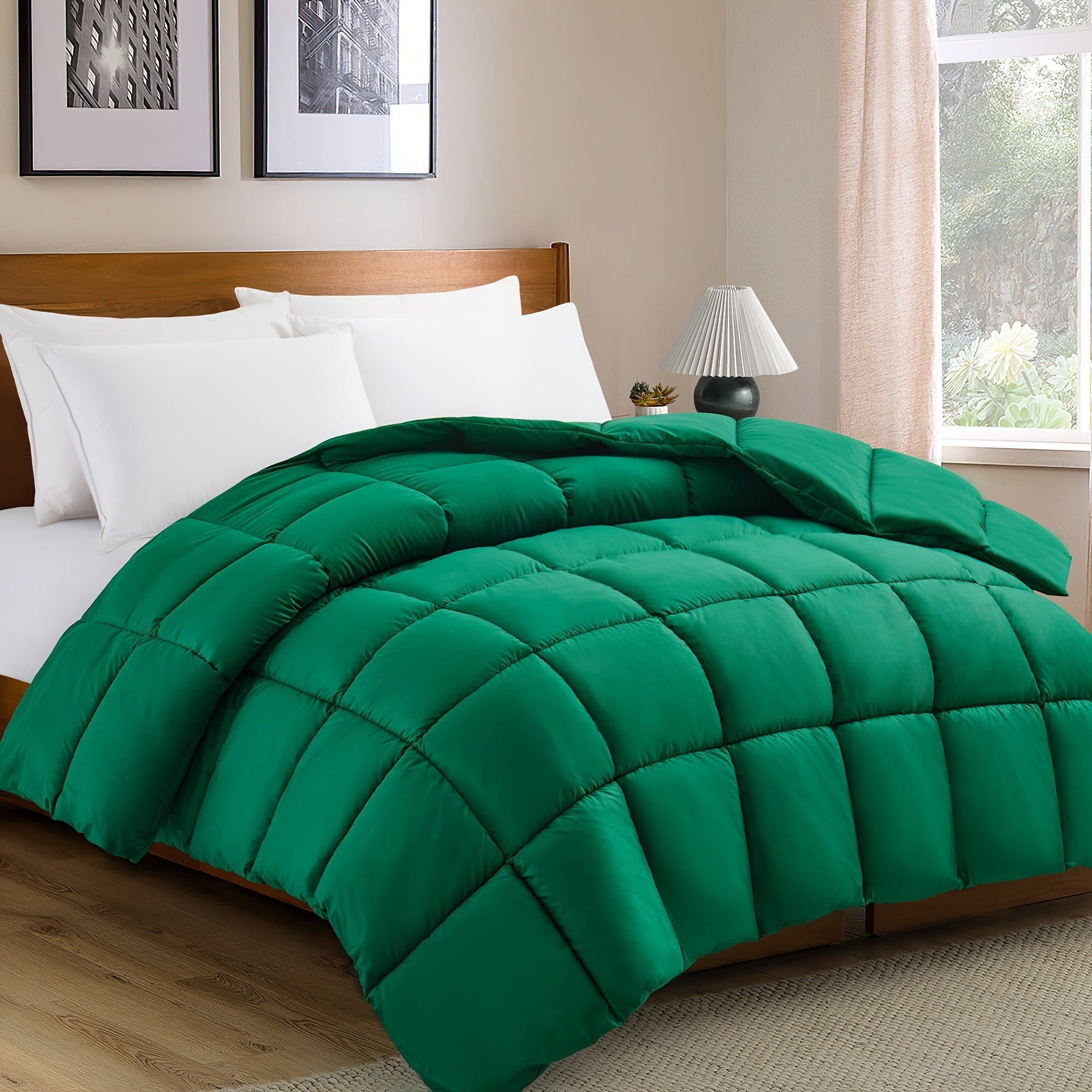 Green comforter on a bed in a bedroom with a lamp and window.