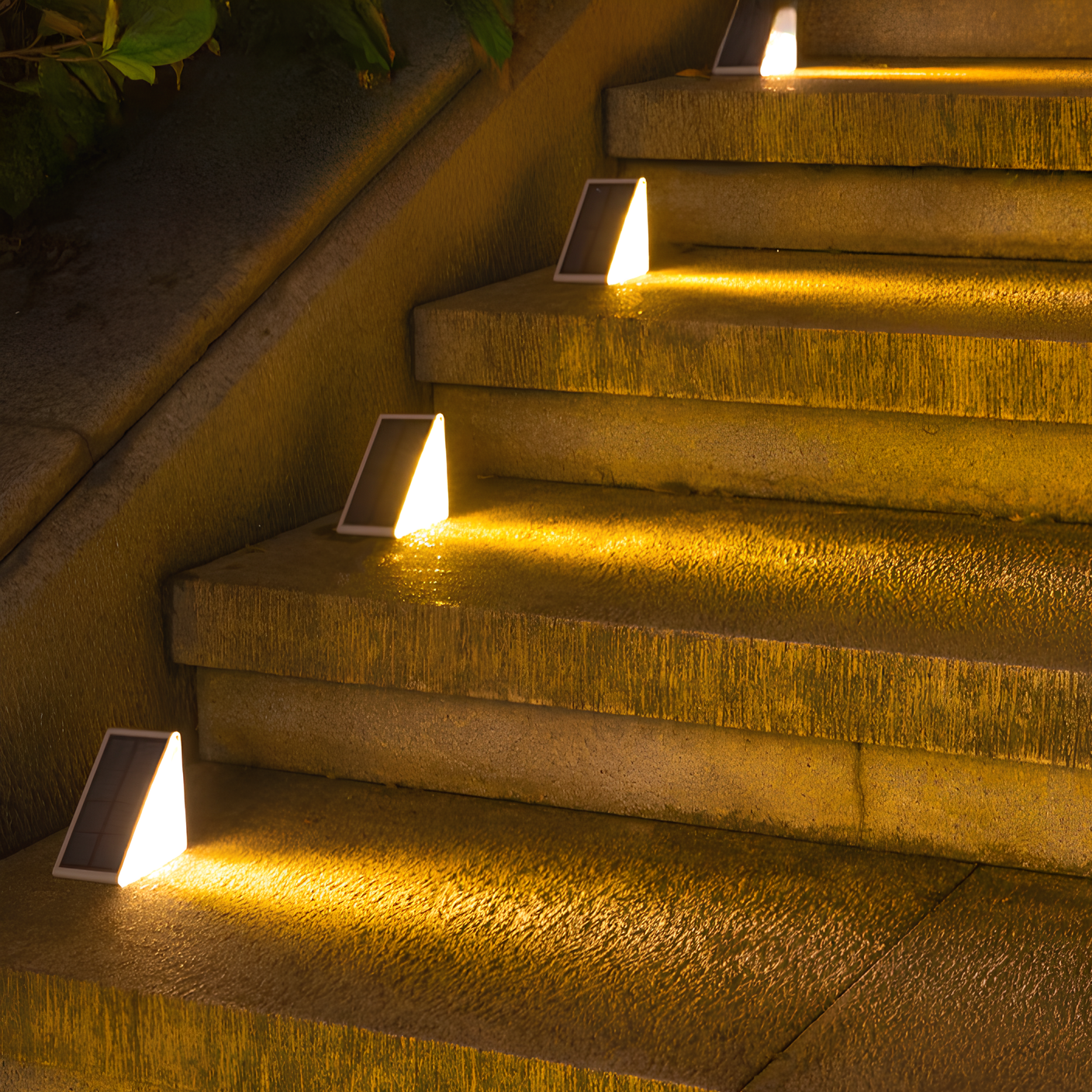 Solar-powered step lights illuminating outdoor steps