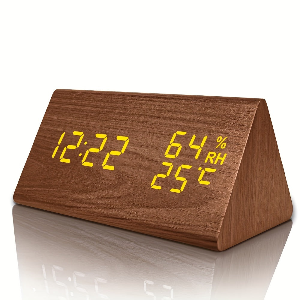 Wooden digital clock with LED display on a white background