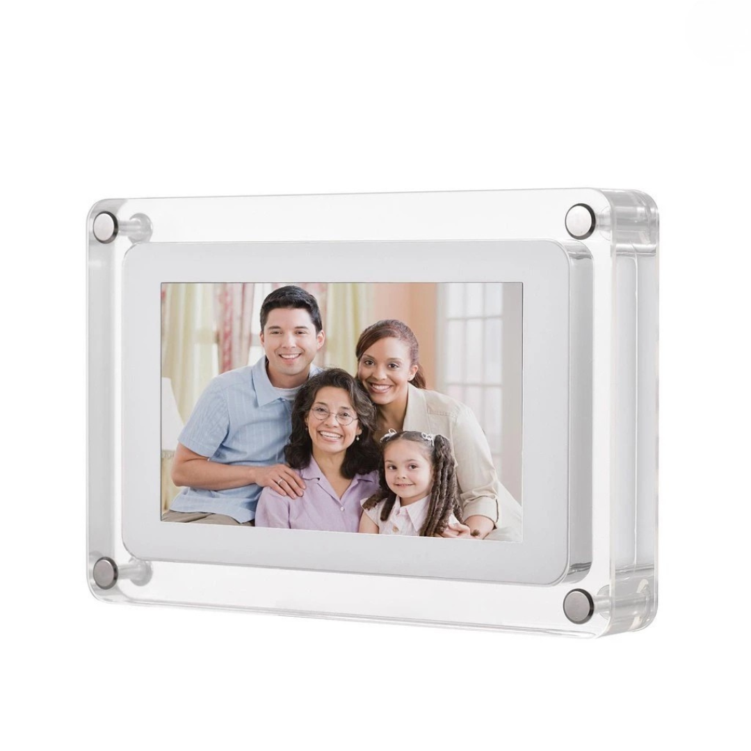Digital photo frame displaying a family photo on a white background