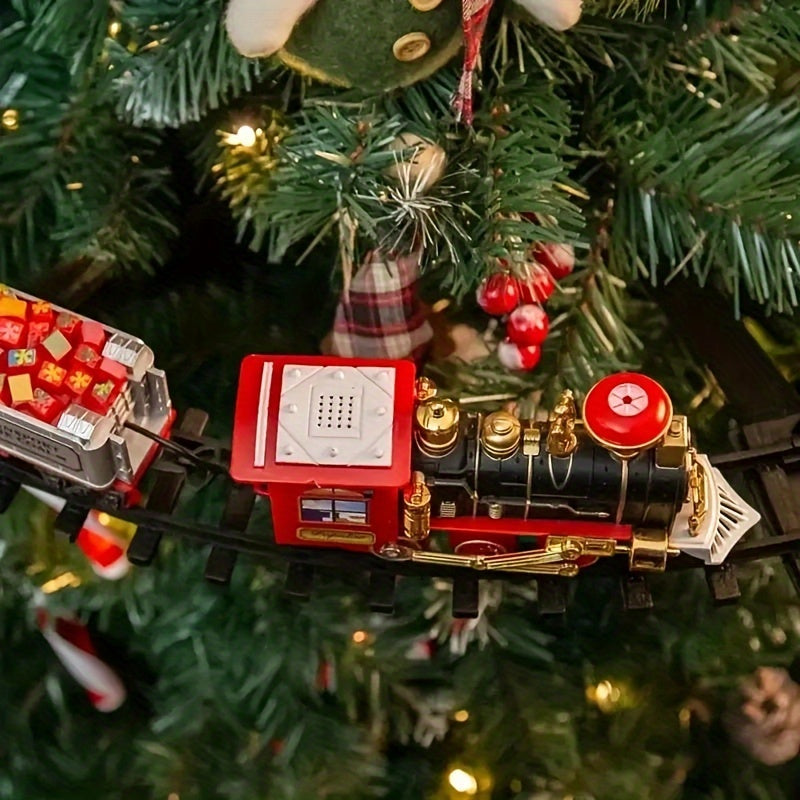 Toy train set on a track with Christmas tree decorations