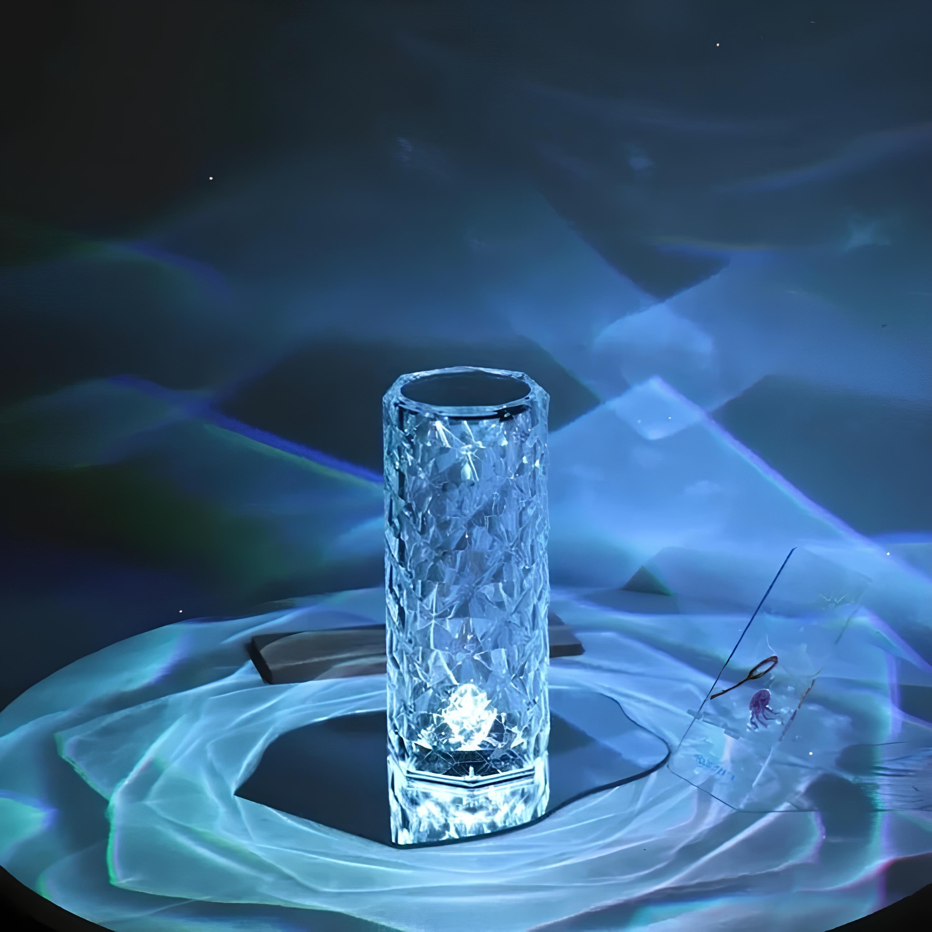 Crystal glass vase on a reflective surface with blue lighting