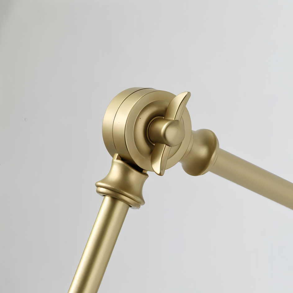 Gold towel bar on a light gray background