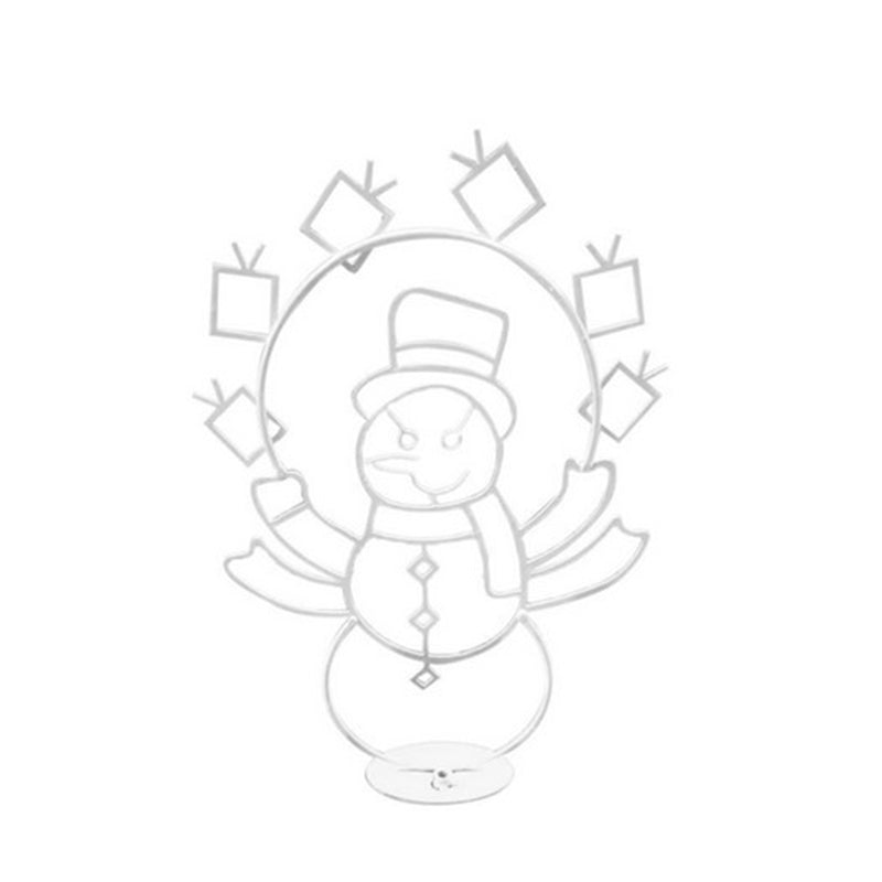 Outline of a snowman with a wreath on a white background