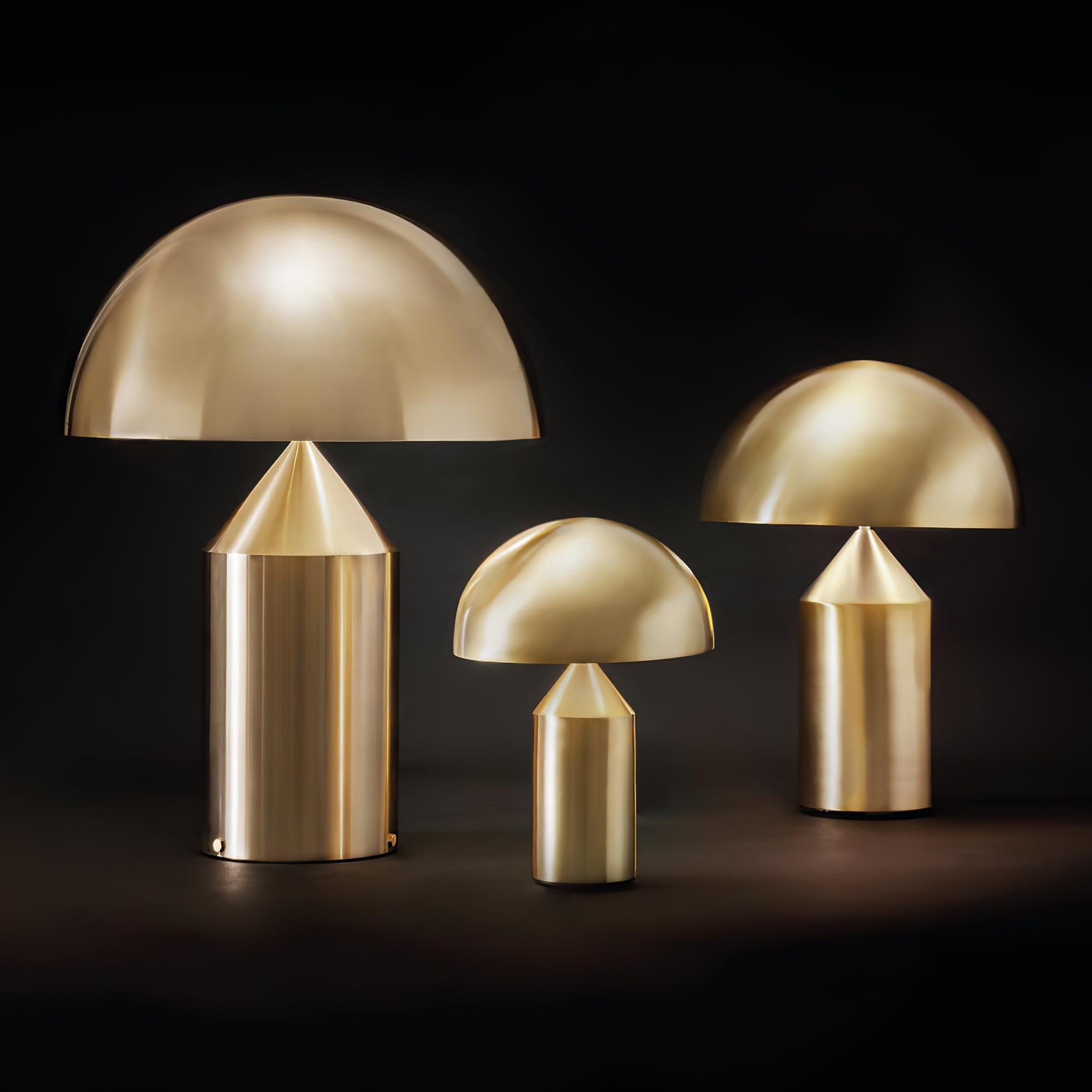 Set of gold metallic lamps on a dark background