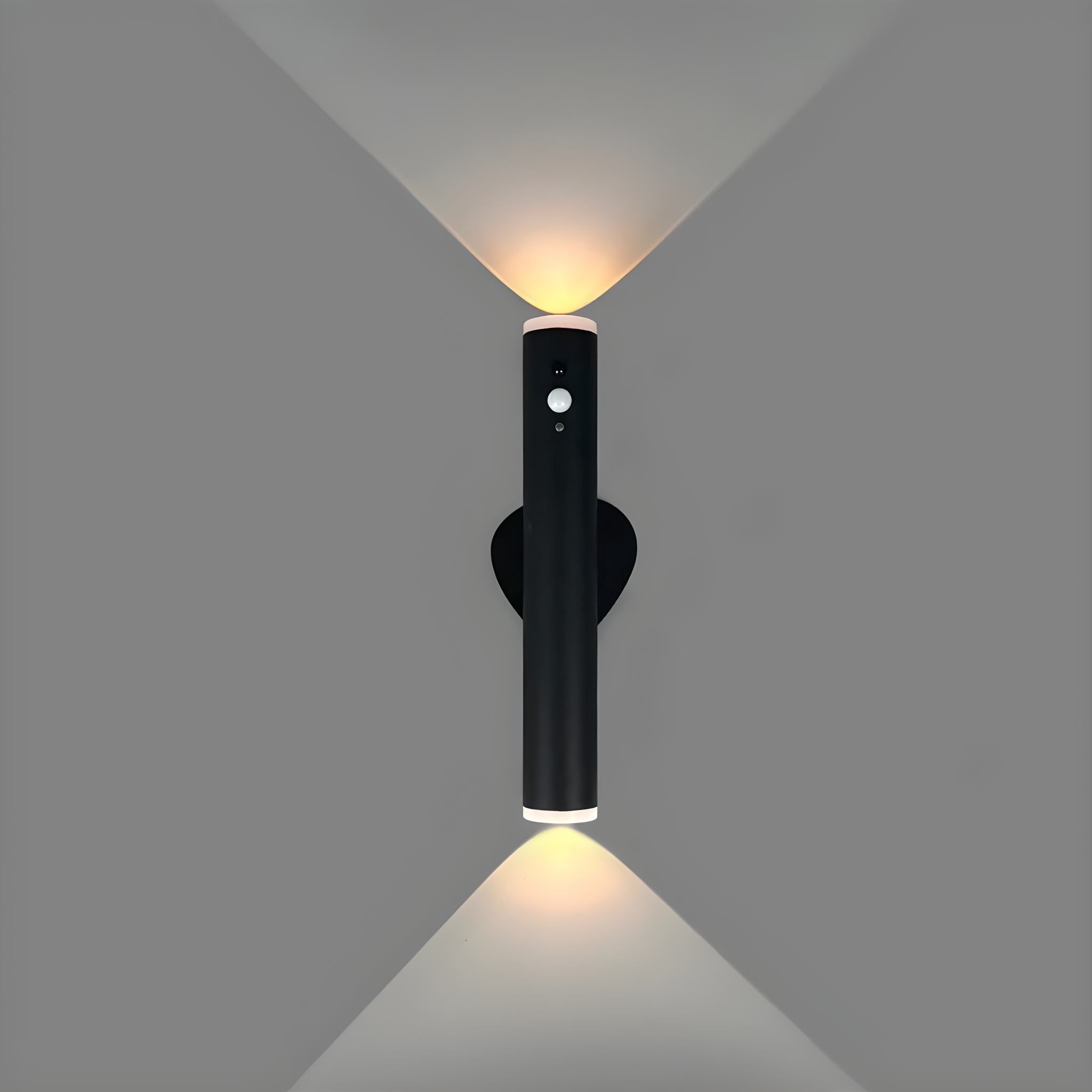 Black wall-mounted light fixture on a gray background