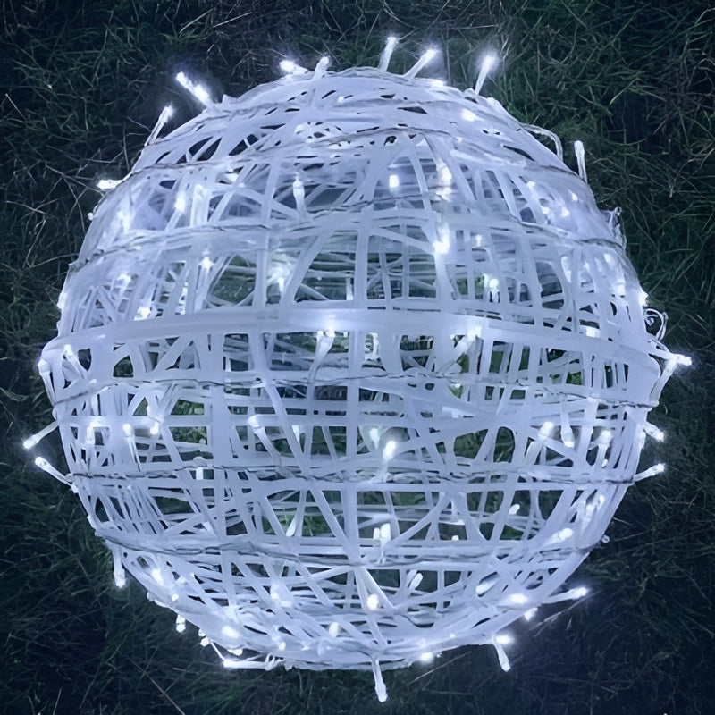 Decorative sphere with string lights on a dark background