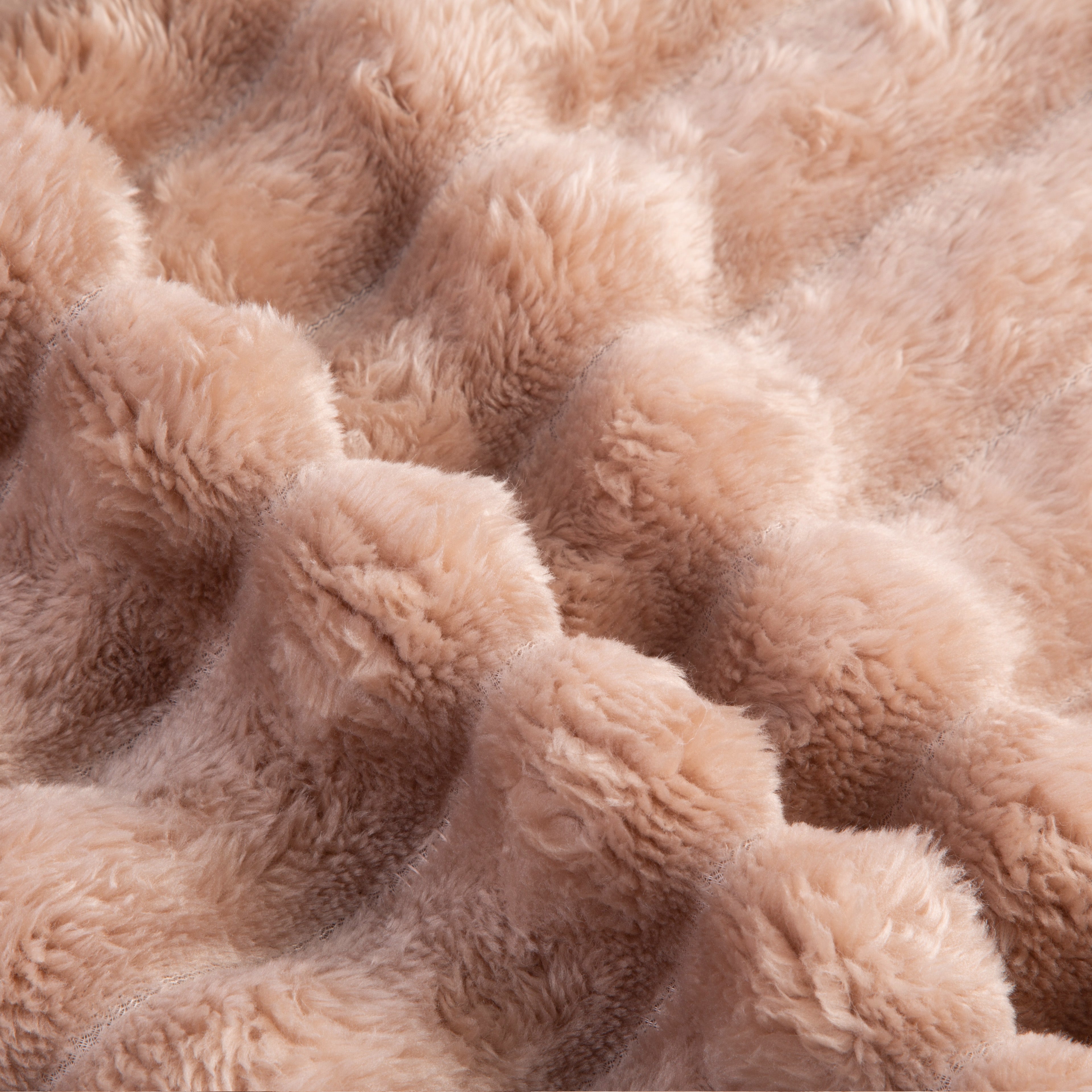 Close-up of beige, fluffy fabric texture