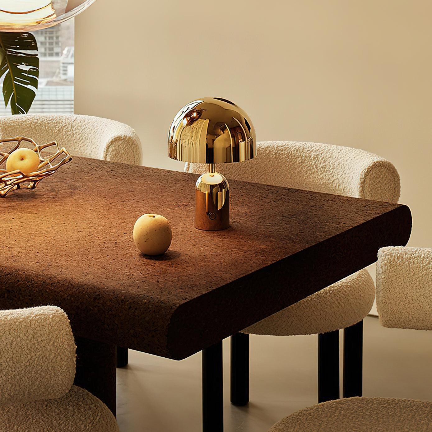 Dining table with decorative items in a modern interior setting