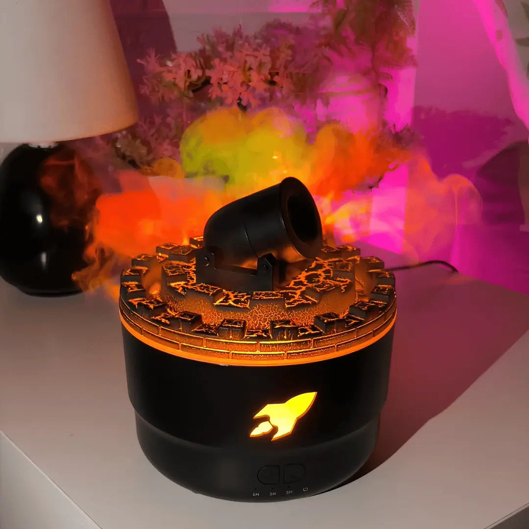 Black diffuser with rocket design on a white surface, surrounded by colorful smoke.