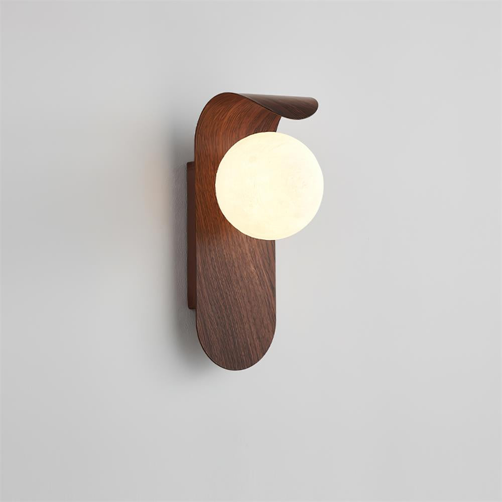 Wooden wall lamp with a round light bulb on a plain background