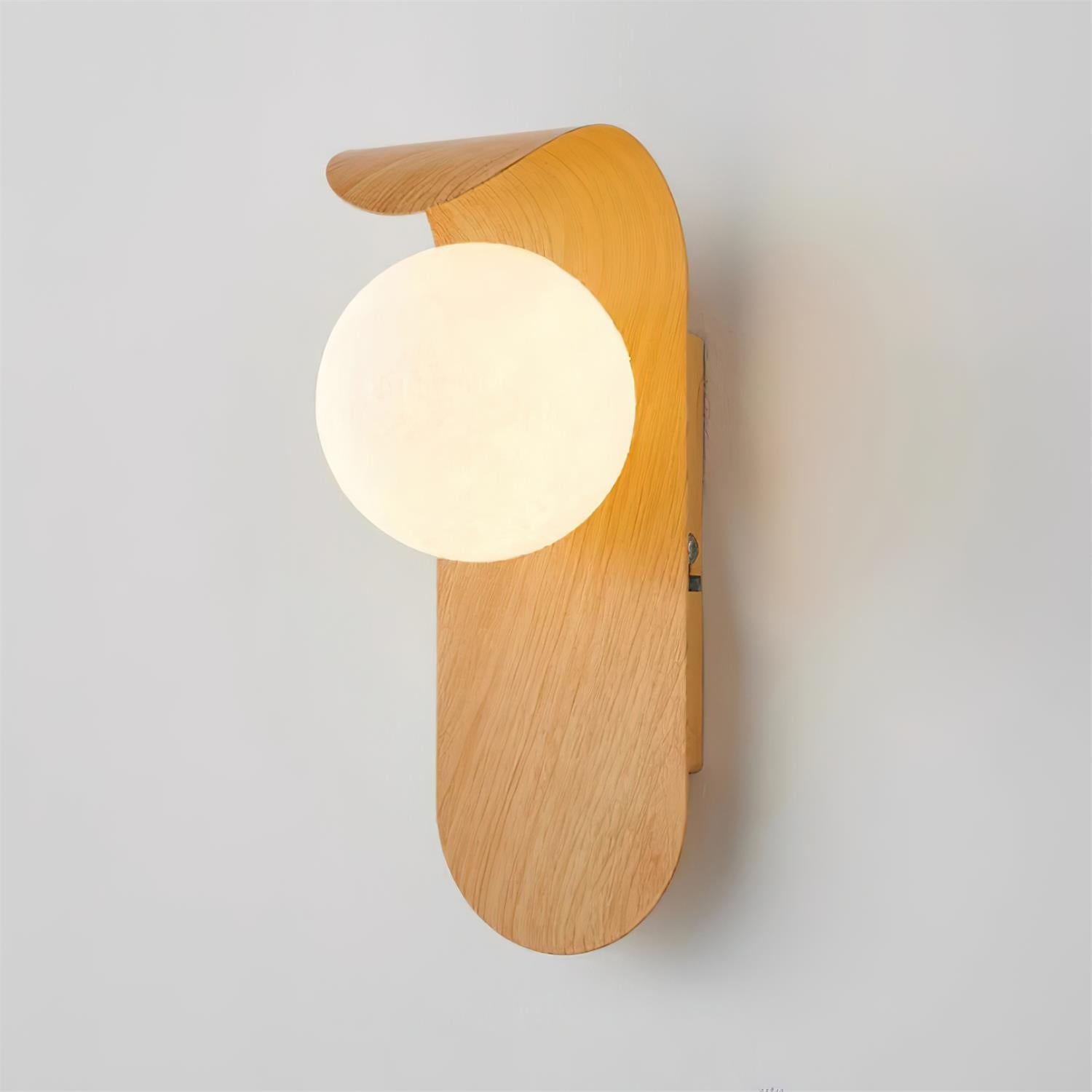 Wooden wall lamp with a round light bulb on a gray background