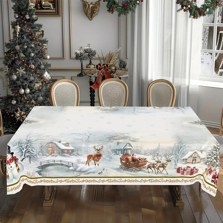 Dining room with a Christmas-themed tablecloth featuring reindeer and Santa Claus.