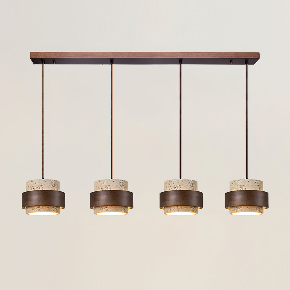 Modern pendant light fixture with four cylindrical lamps on a neutral background