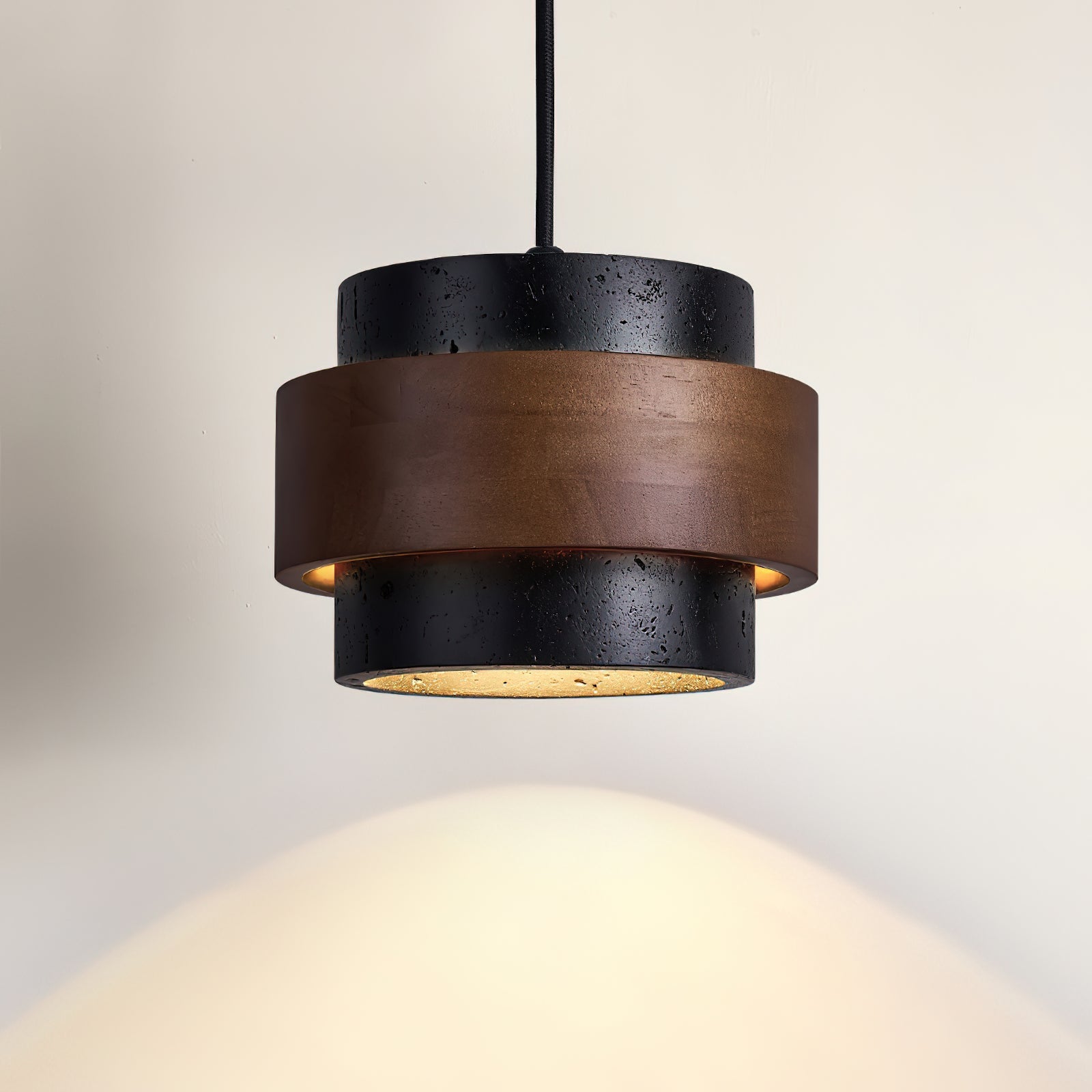 Modern pendant light with wooden and black design on a neutral background