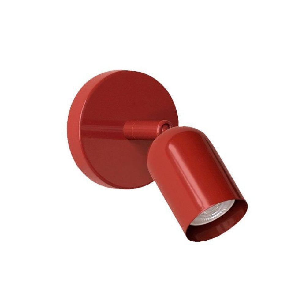 Red wall light fixture on a white background