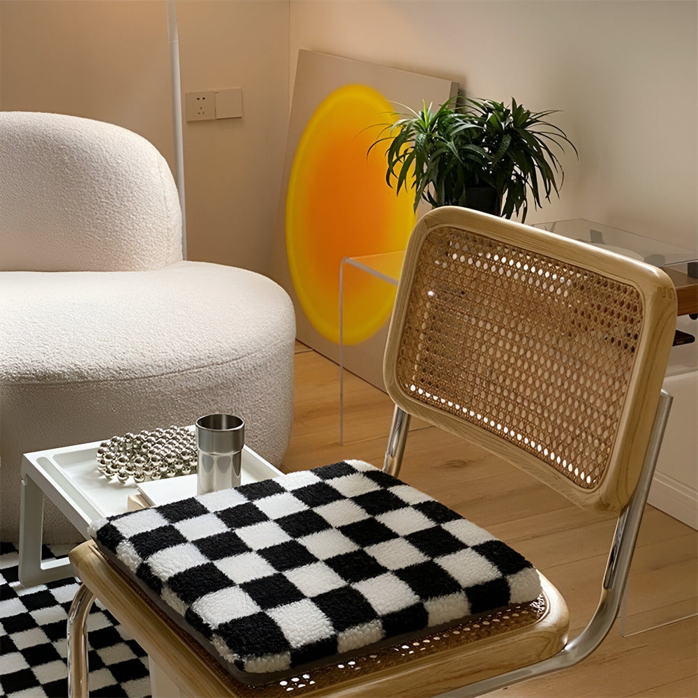 Chair with a checkered cushion in a room setting